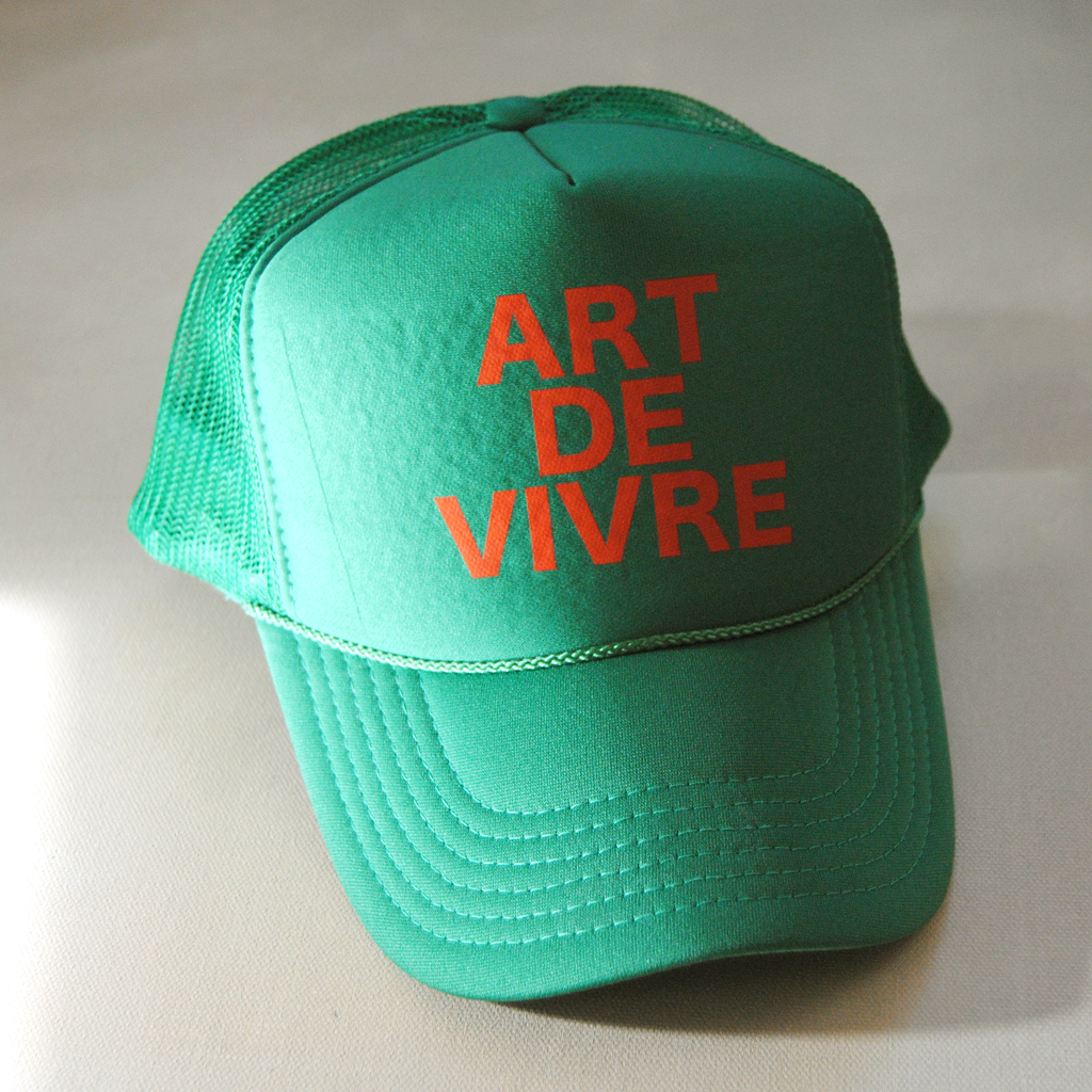 The Art of Living Trucker Hat in Vert